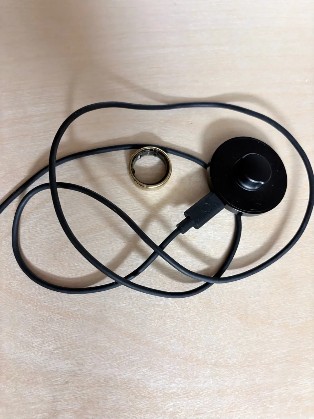 Oura Ring Charger with Gold Oura Ring